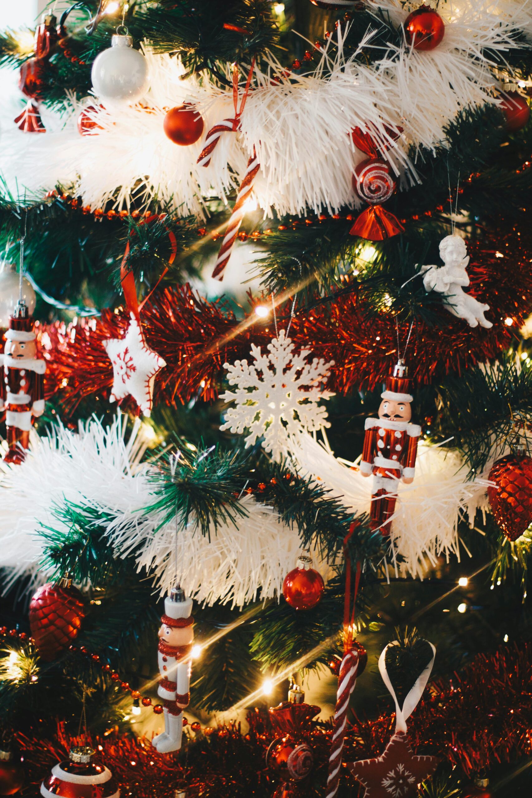 Green Christmas Tree With String Lights and Hanging Decors